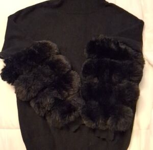 Elegant Black Turtleneck Sweater with Faux Fur Accents